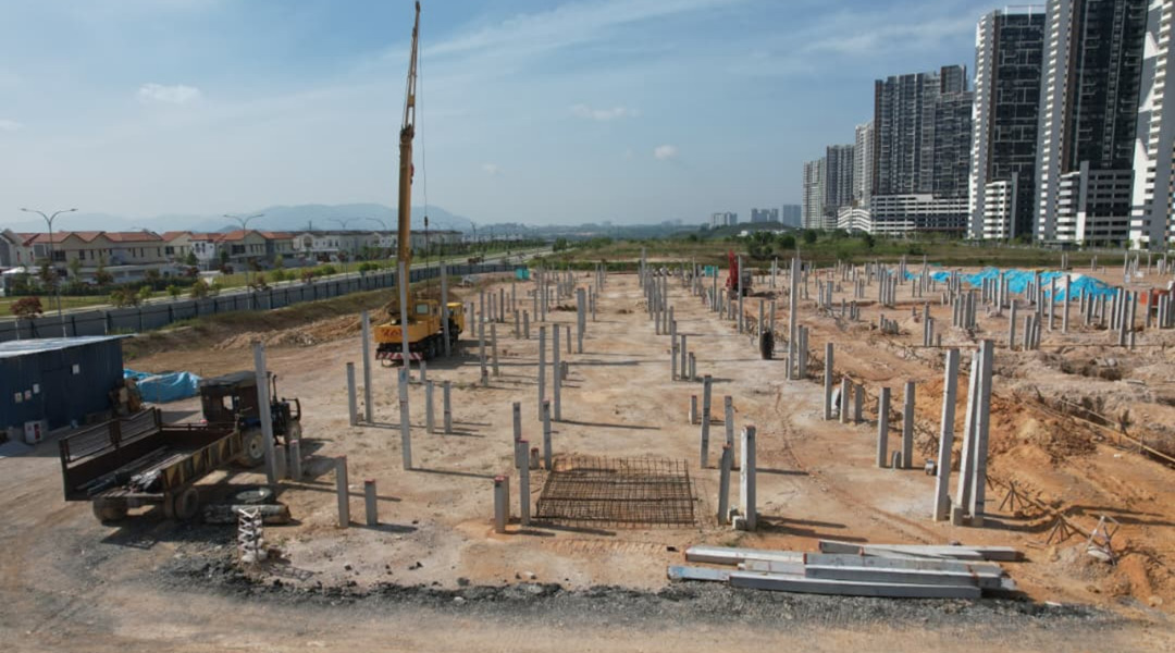 Piling and foundation works in progress as of 22 Feb 2026